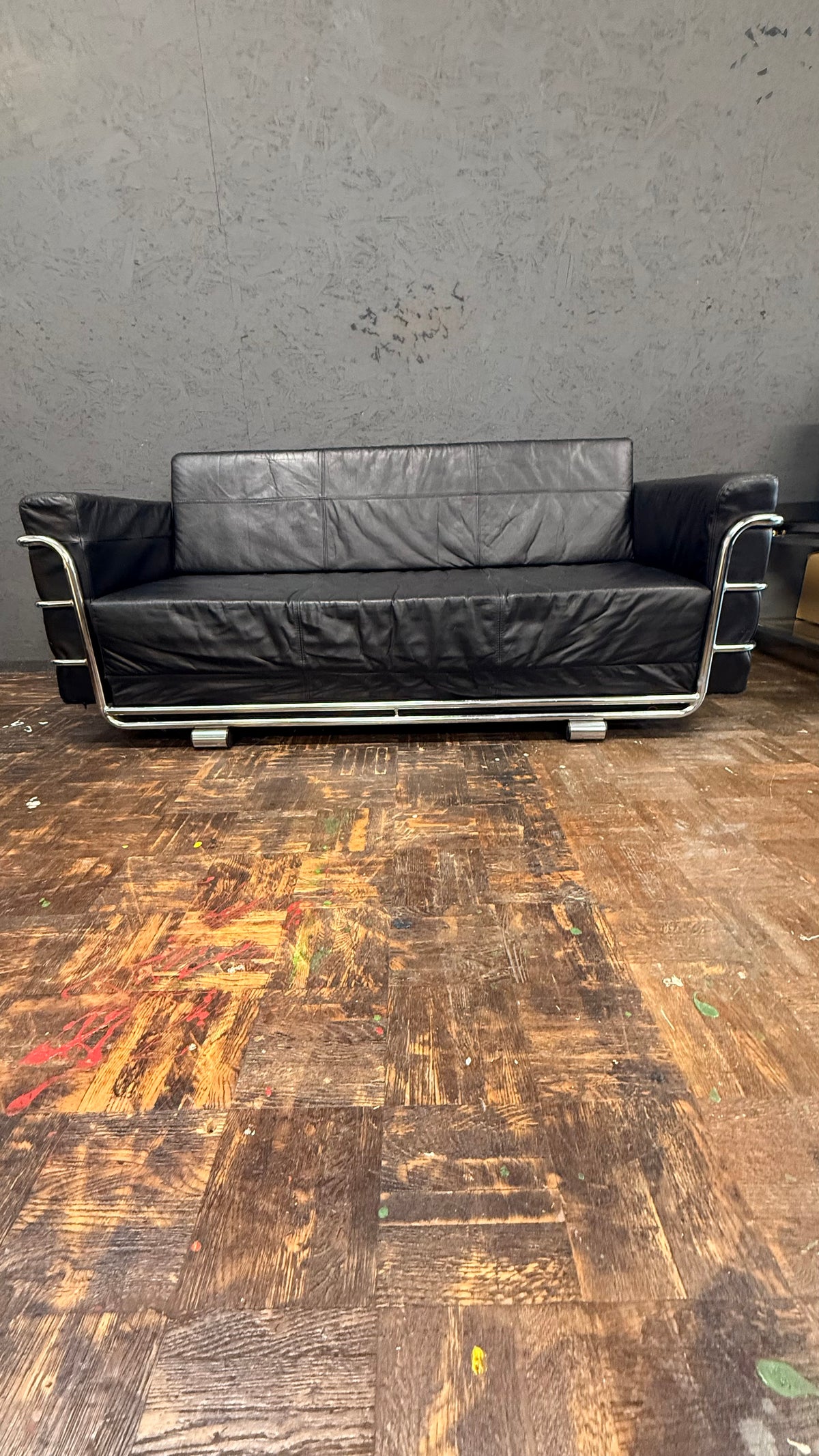 Lederschlafsofa mit Chromgestell – Schwarz
